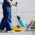 Person with broom
