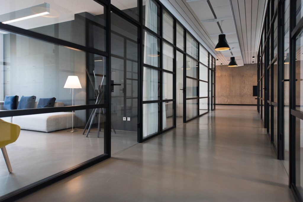 Modern office hallway with window paned windows.
